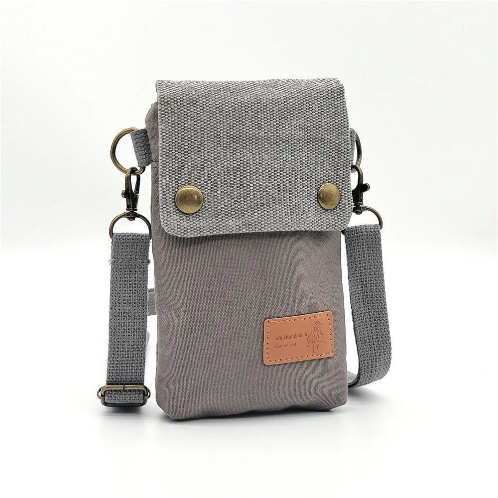 Sacoche bandoulière Linoé femme, pochette smartphone compacte. Accessoire en tissu, organisateur pratique pour mobile.