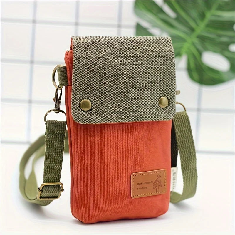 Pochette smartphone Linoé moderne pour femme, organisateur bandoulière en tissu. Cadeau compact et utile.