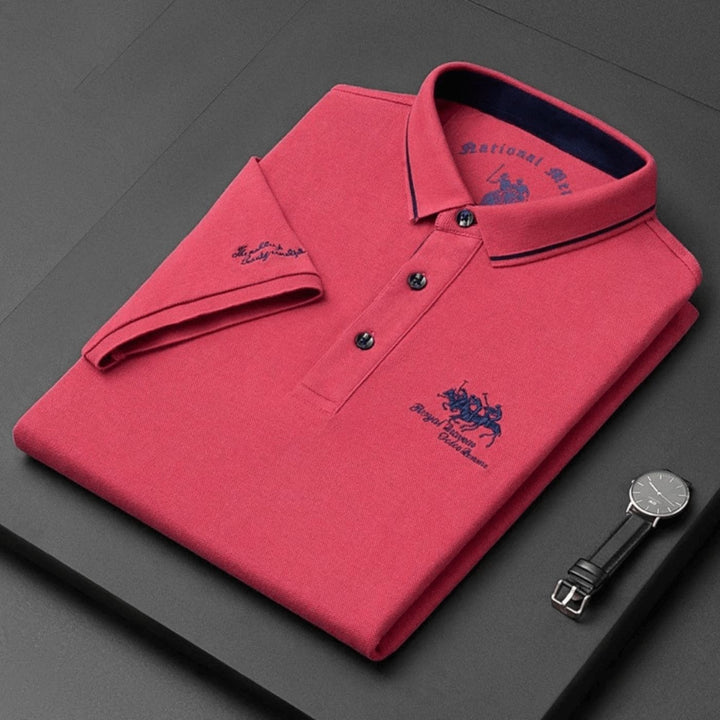 Polo de luxe homme en coton piqué, col classique, couleur unie, coupe droite, style élégant et intemporel.