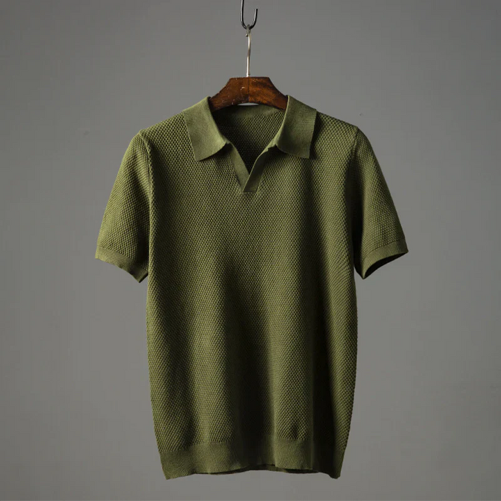 Polo été homme en coton péruvien.  Modèle respirant, coupe élégante et classique.