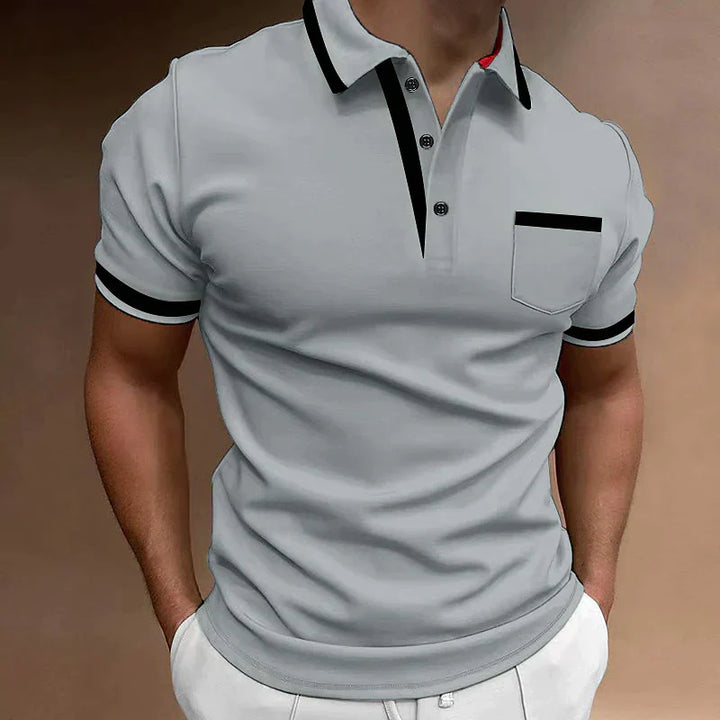 Polo homme ajusté, détails contrastés, coupe moderne.  Tissu confortable.