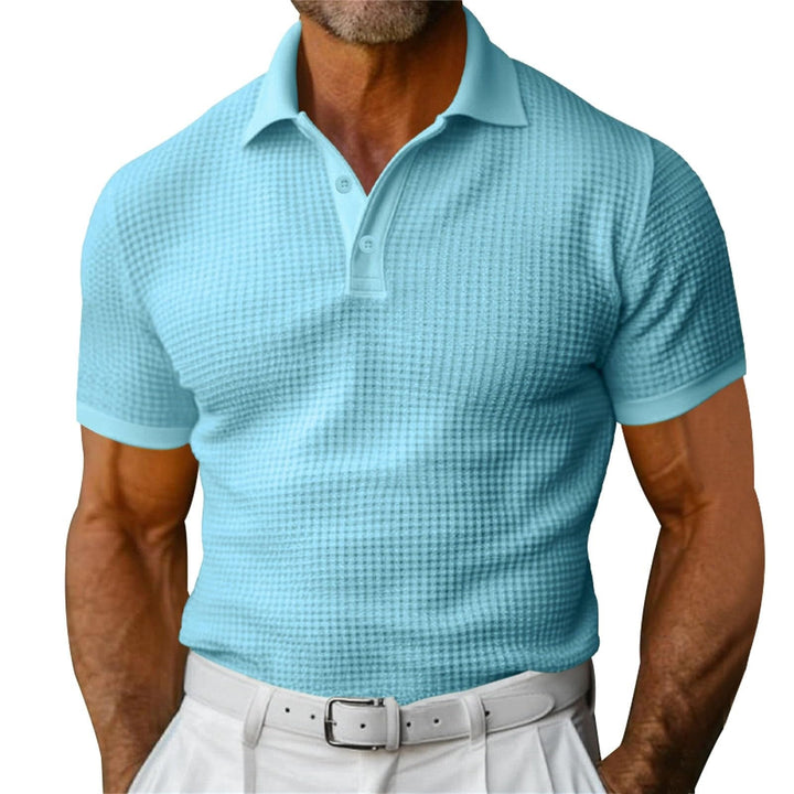 Polo gaufré pour homme, un incontournable de l'été. Style décontracté chic, confort et respirabilité.