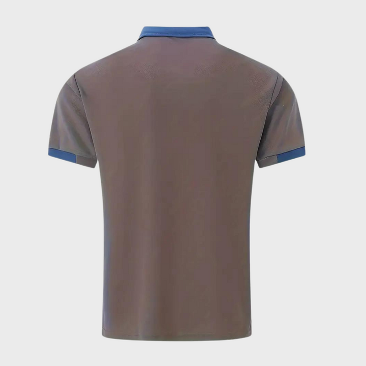 Détail du tissu du polo homme, doux et résistant, pour un confort supérieur.
