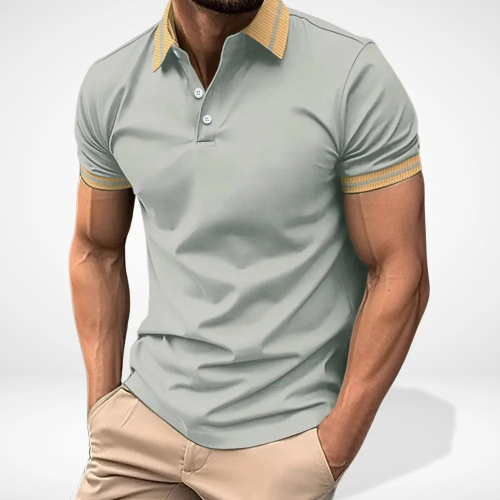 Polo homme confortable à col contrasté, idéal pour une tenue estivale. Vêtement polyvalent et élégant.
