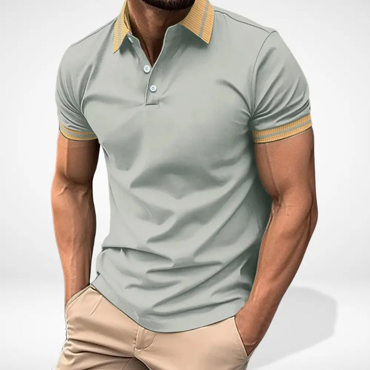 Polo homme confortable à col contrasté, idéal pour une tenue estivale. Vêtement polyvalent et élégant.