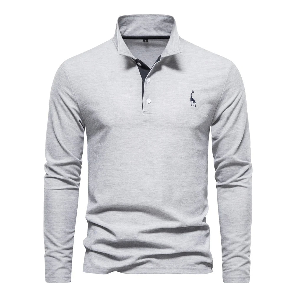 "Polo homme manches longues bleu, broderie cerf élégante, style raffiné, tissu doux et confortable pour toutes occasions"