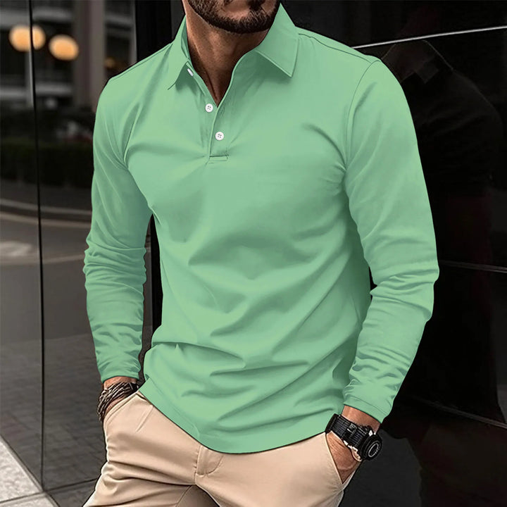 Polo homme manches longues, coupe ajustée, tissu respirant.  Elégant et confortable.