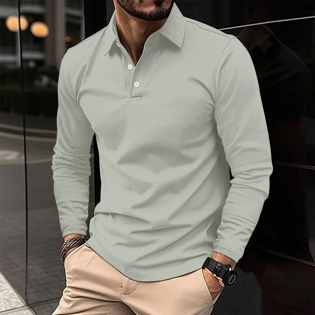 Polo homme manches longues, coupe ajustée, tissu respirant.  Elégant et confortable.
