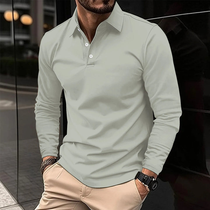 Polo homme manches longues, coupe ajustée, tissu respirant.  Elégant et confortable.
