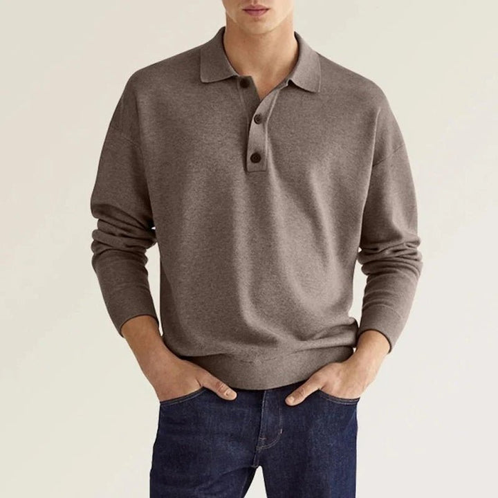 Polo homme manches longues, coupe élégante et confortable.  Tissu doux, idéal pour un style décontracté.