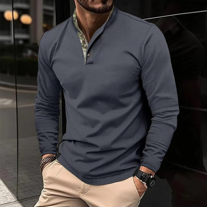 Polo homme manches longues, élégant et confortable.  Coupe impeccable, tissu doux.