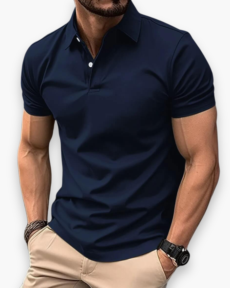"Polo sportif classique homme bleu marine, coupe ajustée, élégant et polyvalent pour sport et sorties décontractées."