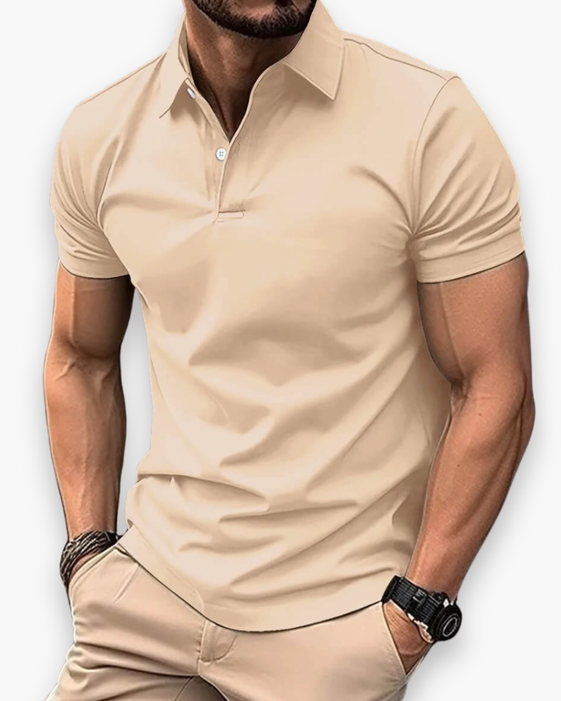 "Polo sportif classique homme bleu marine, coupe ajustée, élégant et polyvalent pour sport et sorties décontractées."