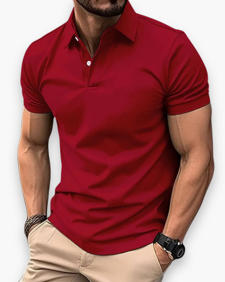 "Polo sportif classique homme bleu marine, coupe ajustée, élégant et polyvalent pour sport et sorties décontractées."