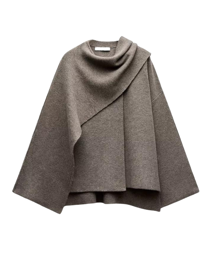 Poncho asymétrique femme gris foncé, élégant et chaud pour l'hiver. Vêtement mode confortable et tendance.