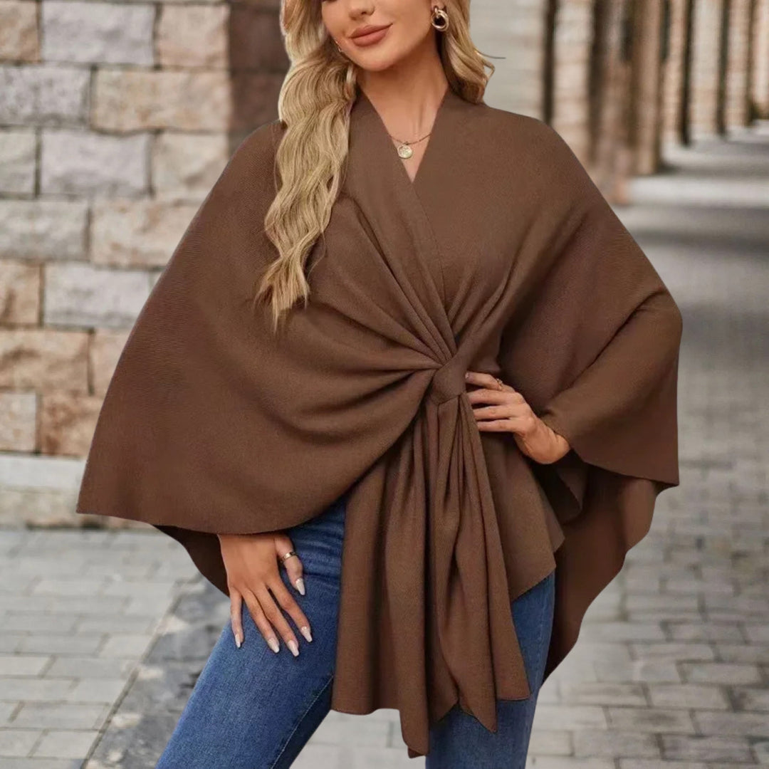 Poncho chic pour femme, idéal pour une allure tendance et chaleureuse durant l'automne.
