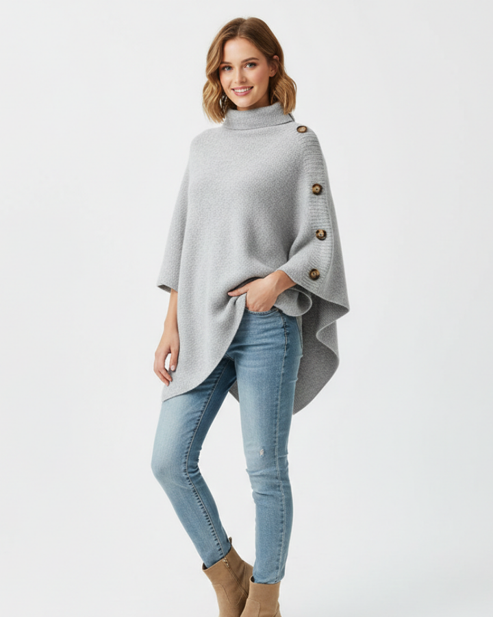 Poncho hiver femme Elayne chic et chaud, design oversize, col haut et ourlet asymétrique pour un style unique.