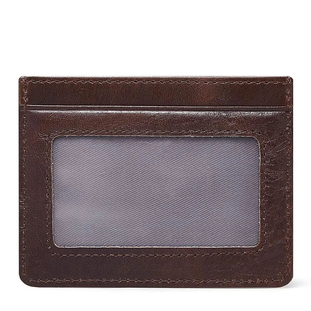 Vue de face d'un porte-cartes en cuir véritable noir, fin, avec couture discrète et protection RFID.