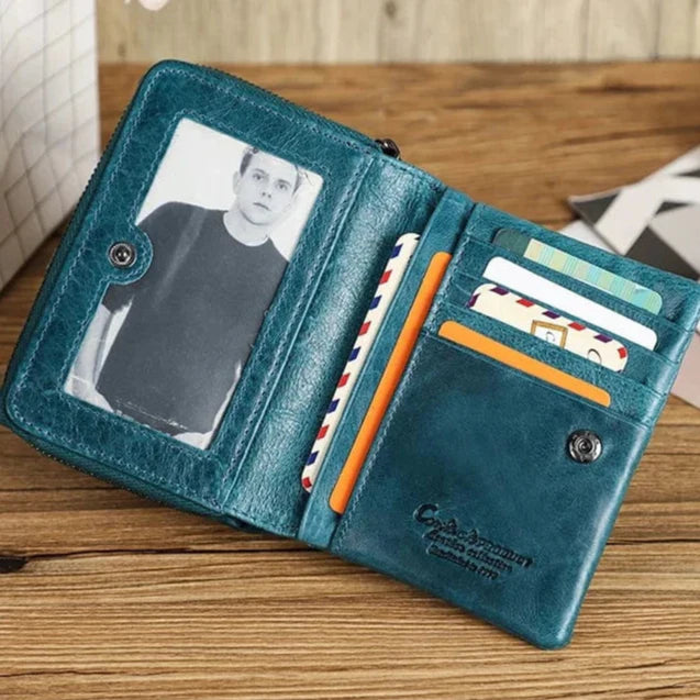 Porte-cartes monnaie femme en cuir vert, accessoire élégant pour ranger cartes et pièces