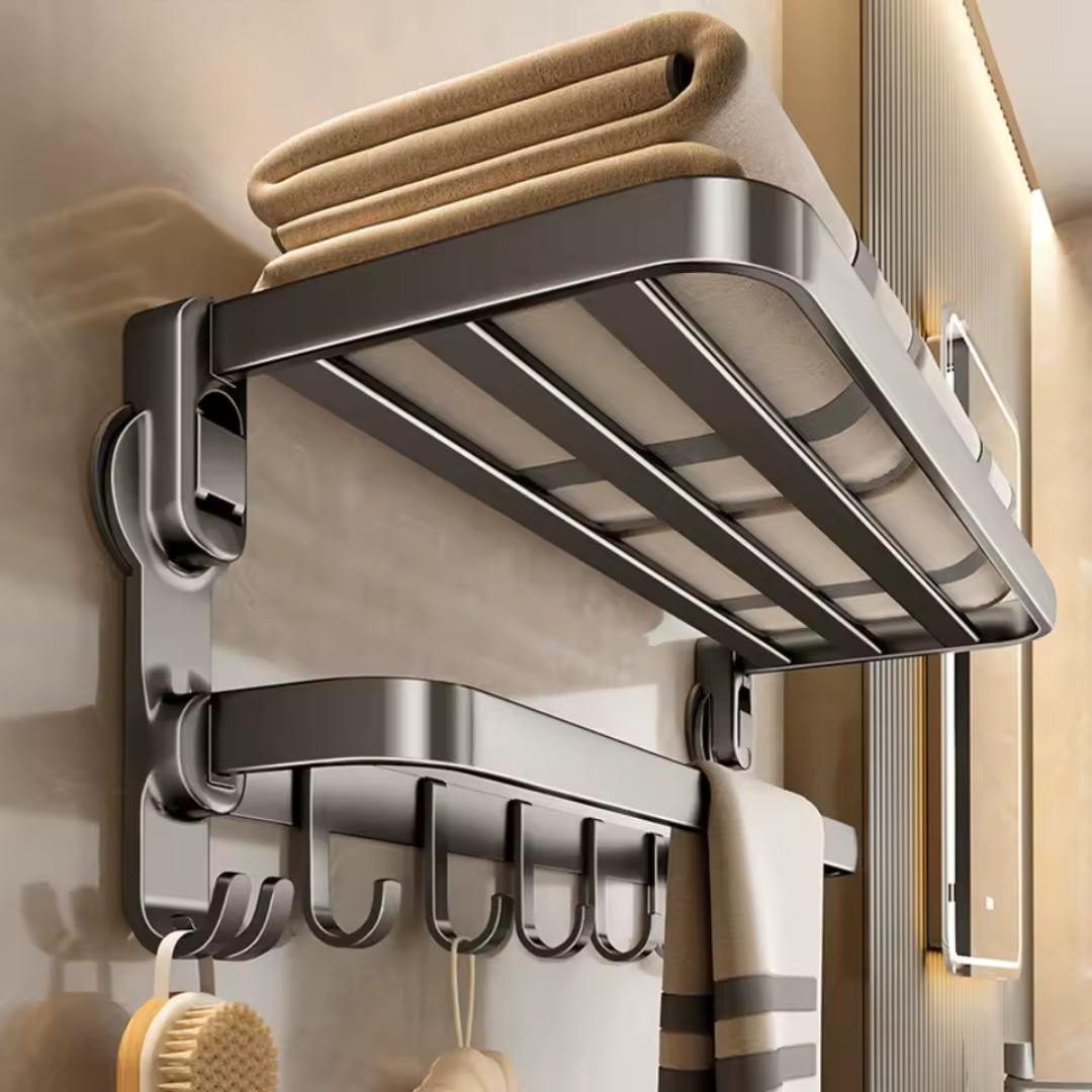 "Porte-serviettes ventouse compact blanc sur mur, design pliable et installation facile sans perçage, idéal salle de bain."