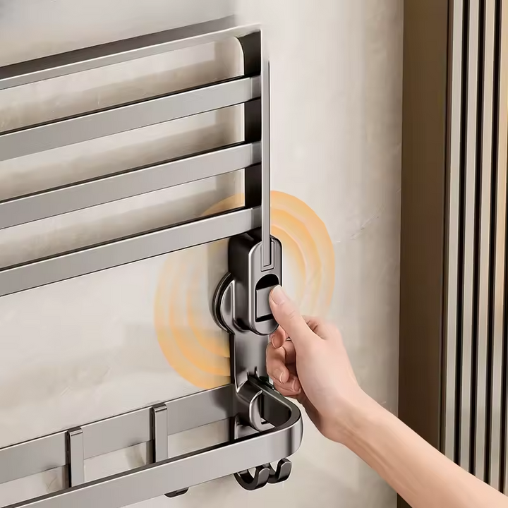 "Porte-serviettes ventouse compact blanc sur mur, design pliable et installation facile sans perçage, idéal salle de bain."