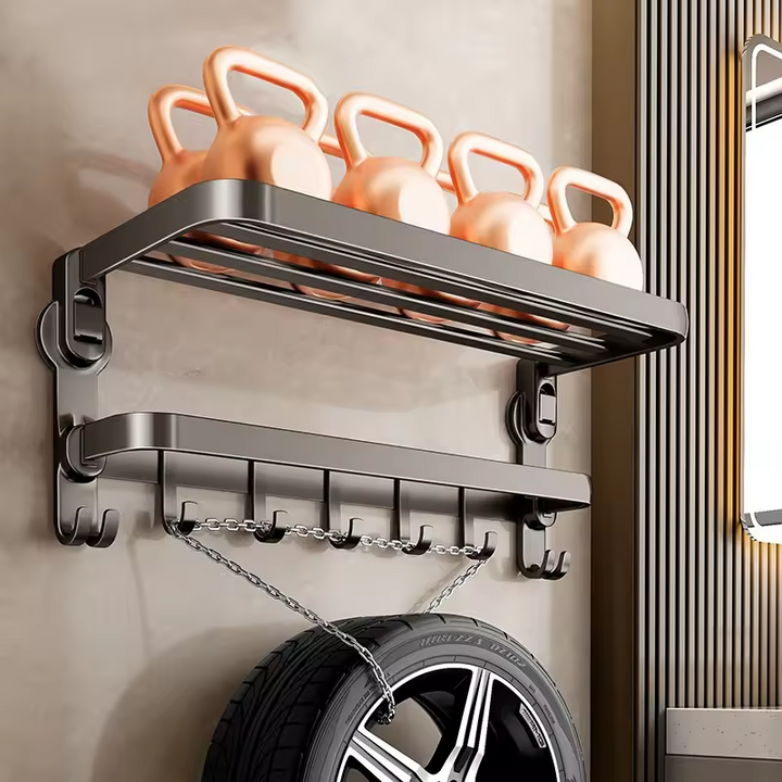 "Porte-serviettes ventouse compact blanc sur mur, design pliable et installation facile sans perçage, idéal salle de bain."