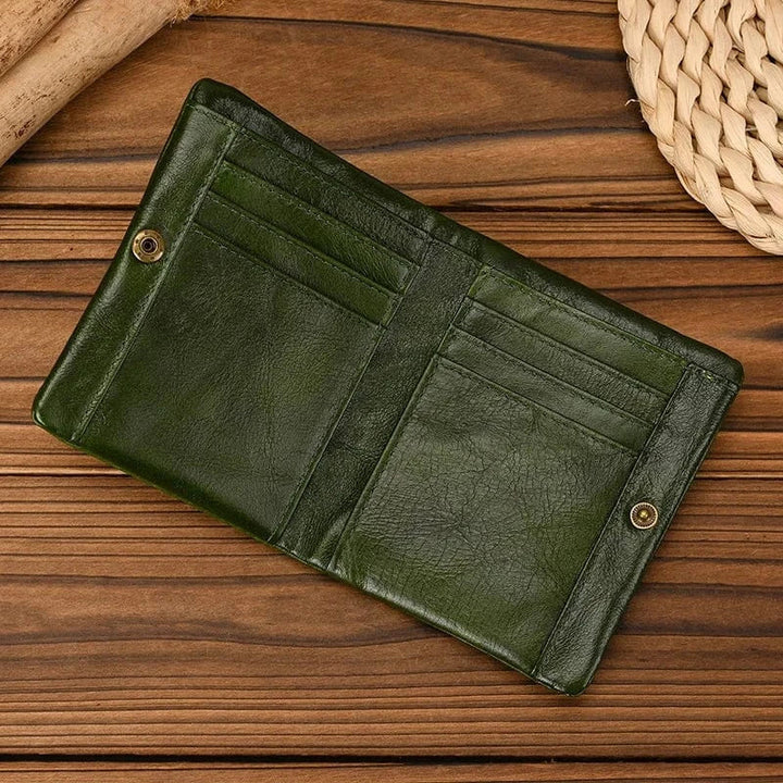 Portefeuille compact en cuir véritable, design minimaliste et grande capacité.