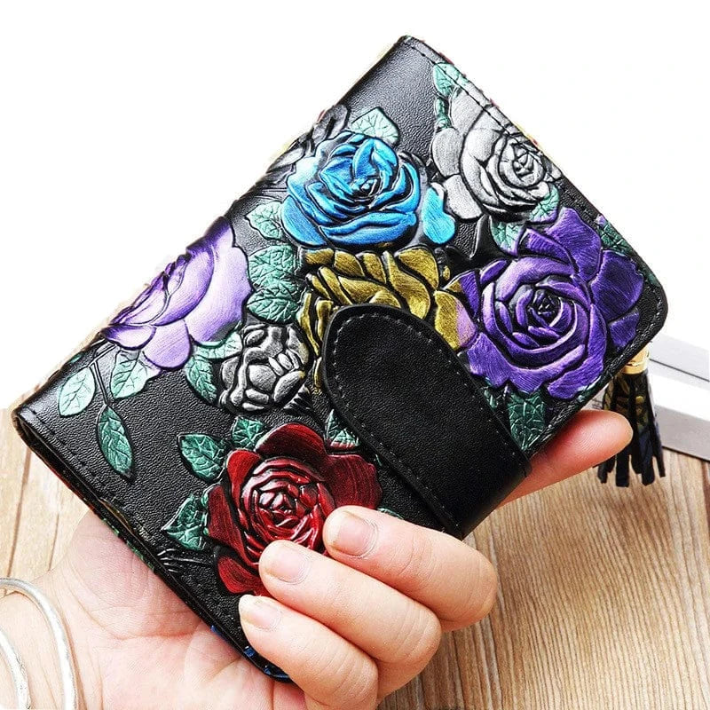 Accessoire femme: portefeuille court en cuir rose, idéal pour sac à main, avec fermeture sécurisée.