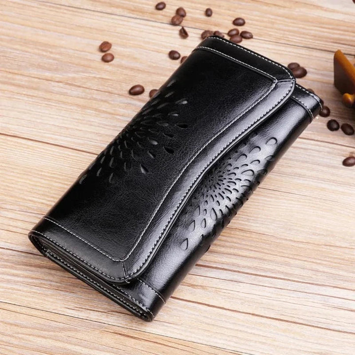 Portefeuille femme en cuir souple rouge vif, avec plusieurs compartiments et protection RFID.
