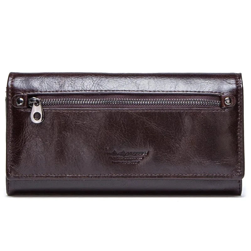 Portefeuille femme en cuir bordeaux, design moderne et organisé, un atout mode pour le quotidien.