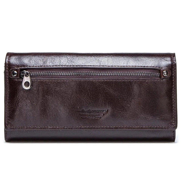 Portefeuille femme en cuir bordeaux, design moderne et organisé, un atout mode pour le quotidien.
