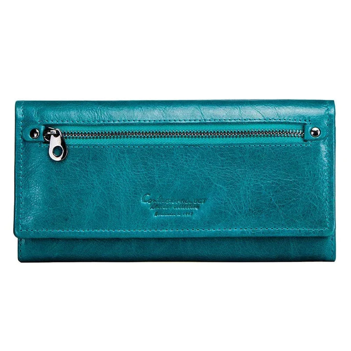 Portefeuille en cuir véritable rose poudré pour femme, un accessoire délicat et organisé.