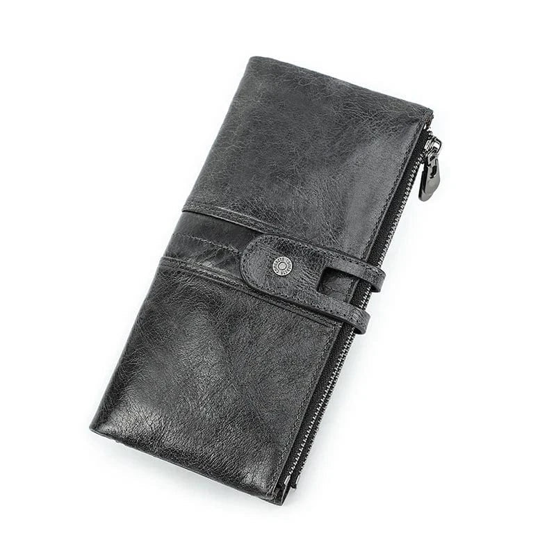 Portefeuille féminin en cuir marron foncé, plusieurs rangements intérieurs, idéal pour organiser.
