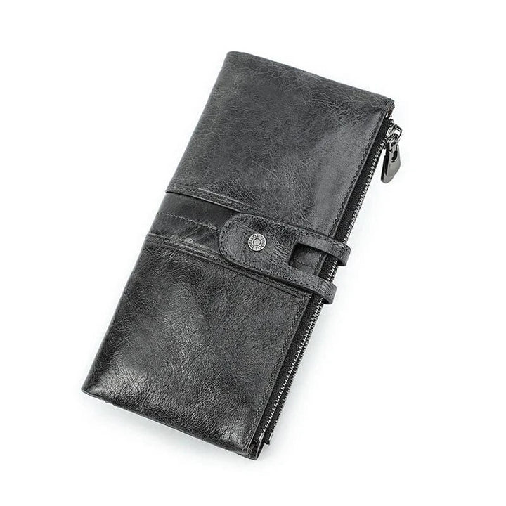 Portefeuille féminin en cuir marron foncé, plusieurs rangements intérieurs, idéal pour organiser.
