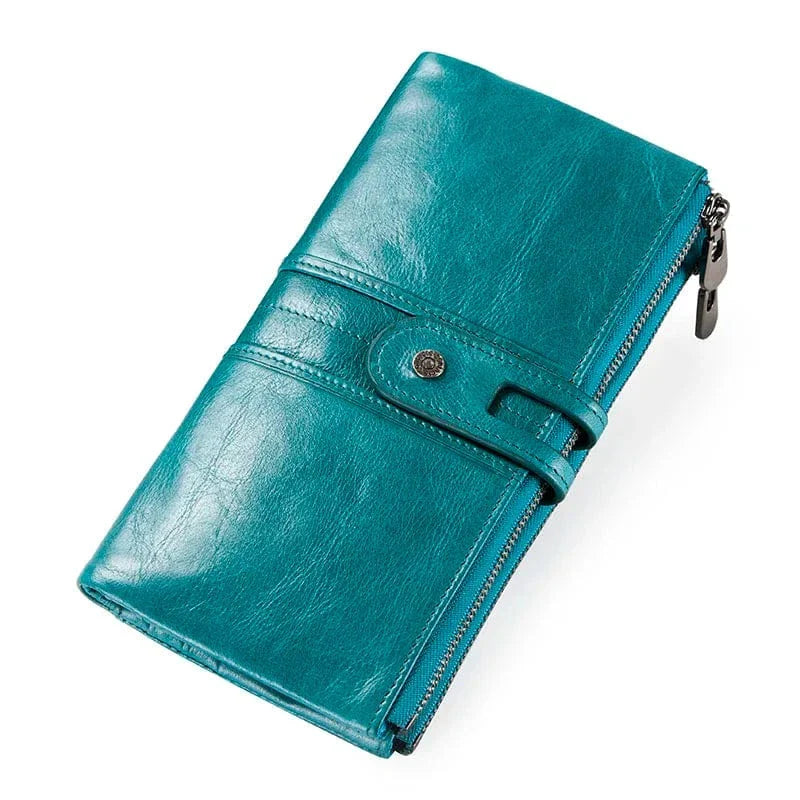 Portefeuille femme, cuir souple, couleur bordeaux, pochette zippée pour la monnaie, style élégant.