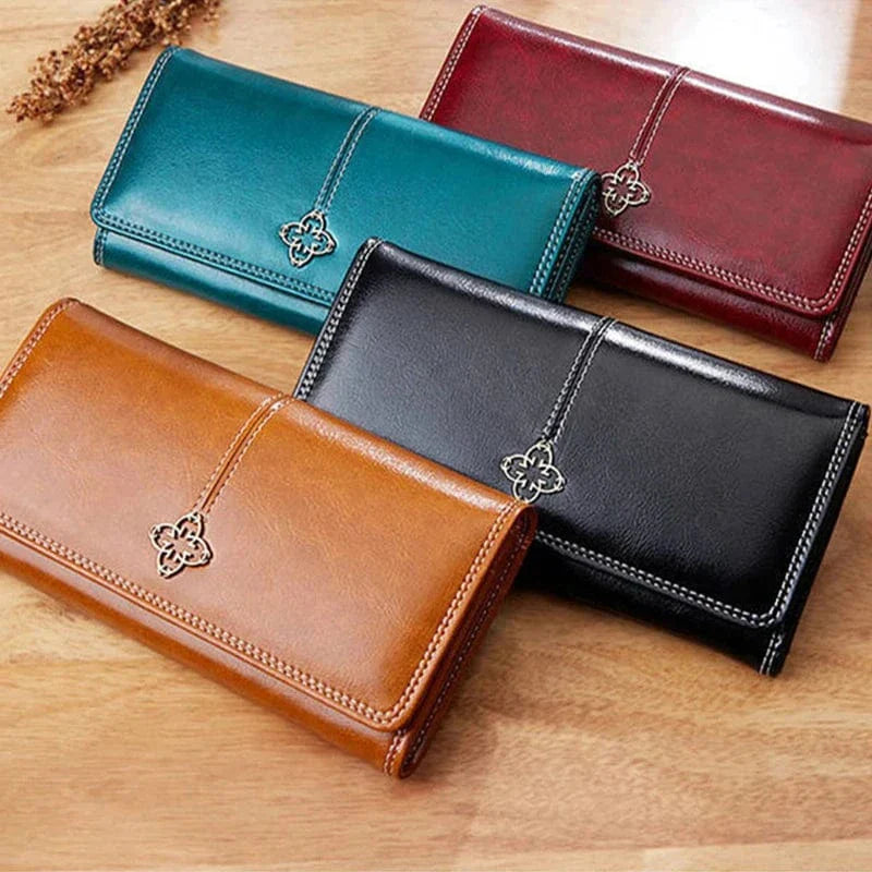 Portefeuille femme en cuir PU bordeaux, avec plusieurs fentes pour cartes et un compartiment zippé pour la monnaie.