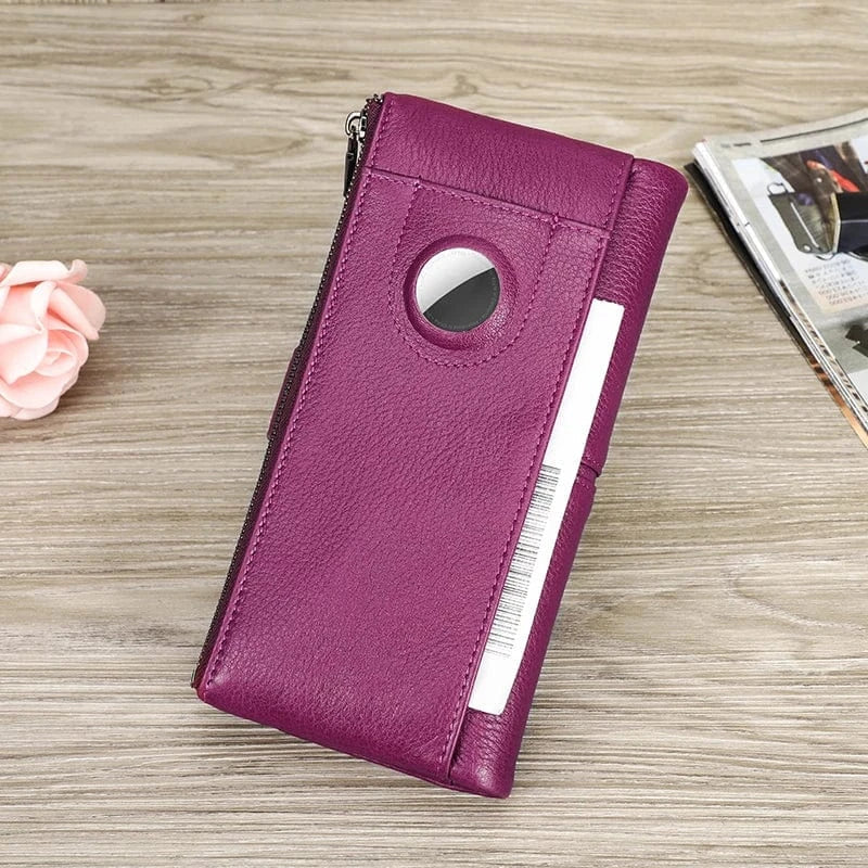 Accessoire de mode: portefeuille femme en cuir vert foncé, parfait pour organiser vos essentiels.