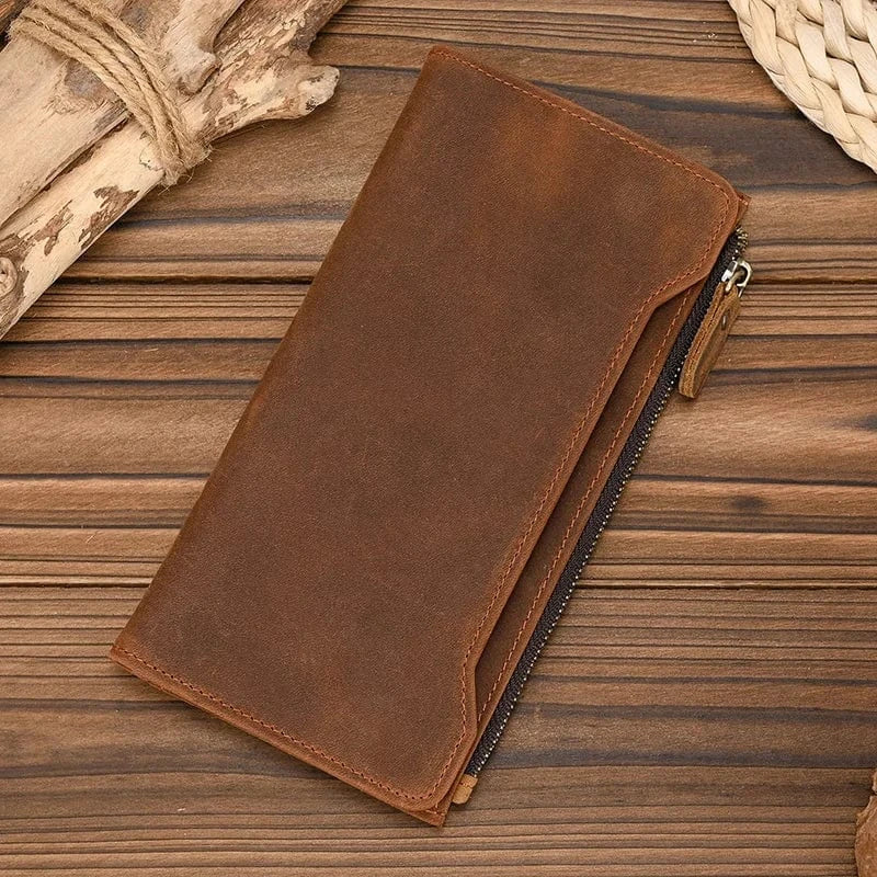 Portefeuille homme en cuir véritable marron foncé, zippé, style classique, pour un accessoire masculin élégant.