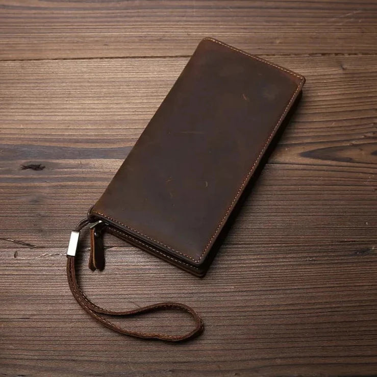 Portefeuille homme long en cuir véritable marron foncé, style vintage, vue frontale.