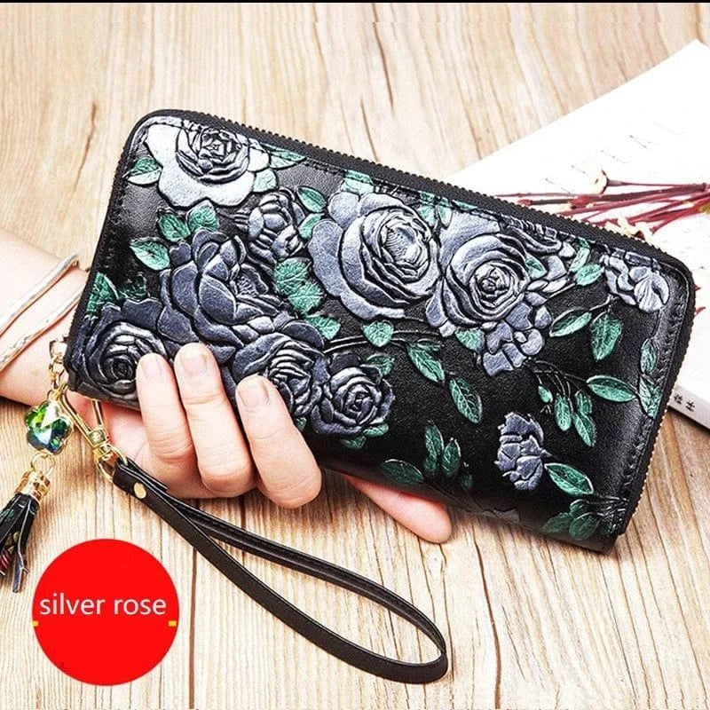 Portefeuille pour femmes en cuir souple avec plusieurs fentes pour cartes et un porte-monnaie zippé