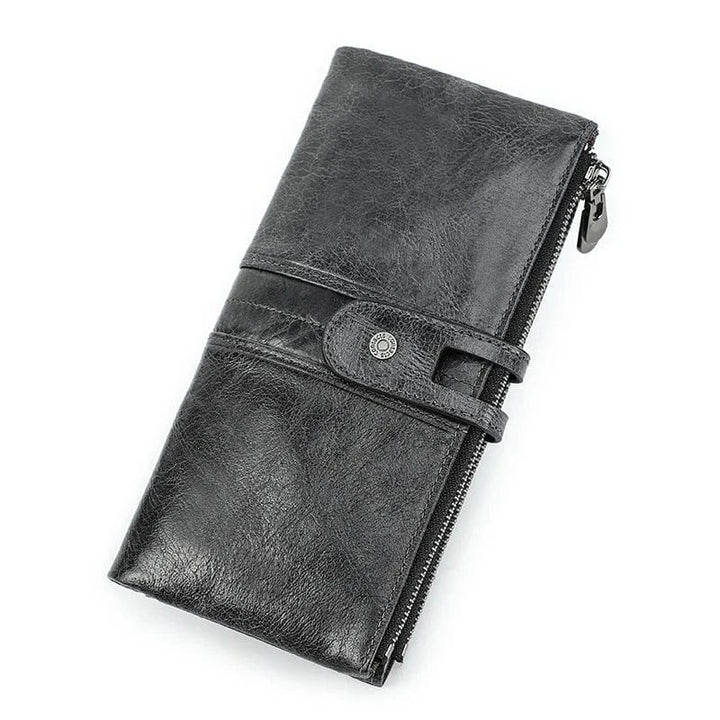 Portefeuille long en cuir noir mat, design épuré et intemporel pour l'homme moderne.