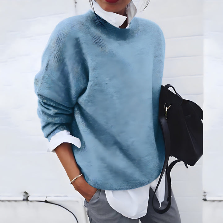 Pull cachemire élégant, doux et chaud.  Coupe flatteuse, idéal pour toutes occasions.