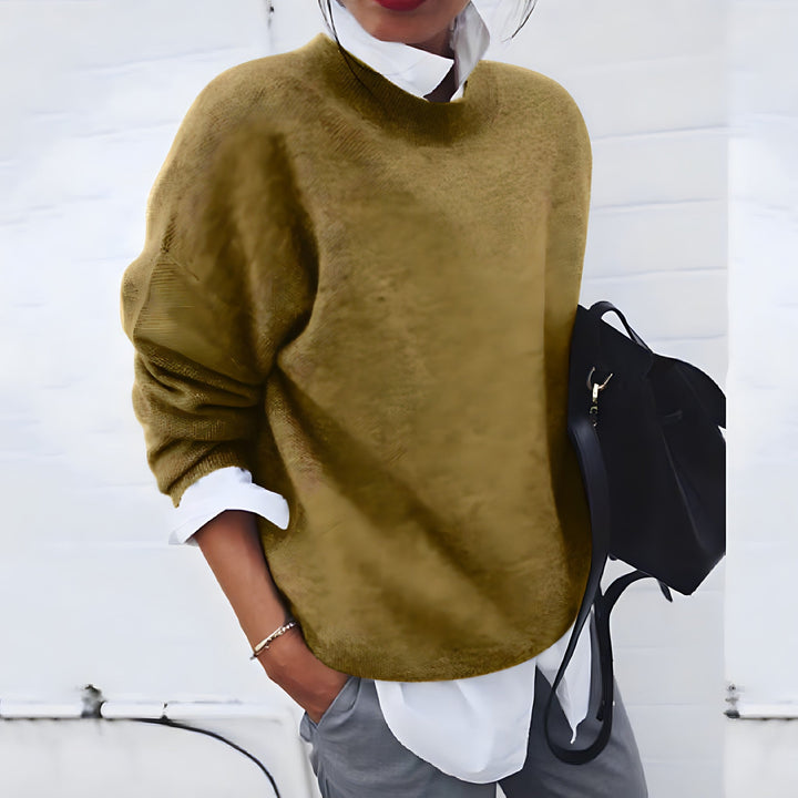 Pull cachemire élégant, doux et chaud.  Coupe flatteuse, idéal pour toutes occasions.
