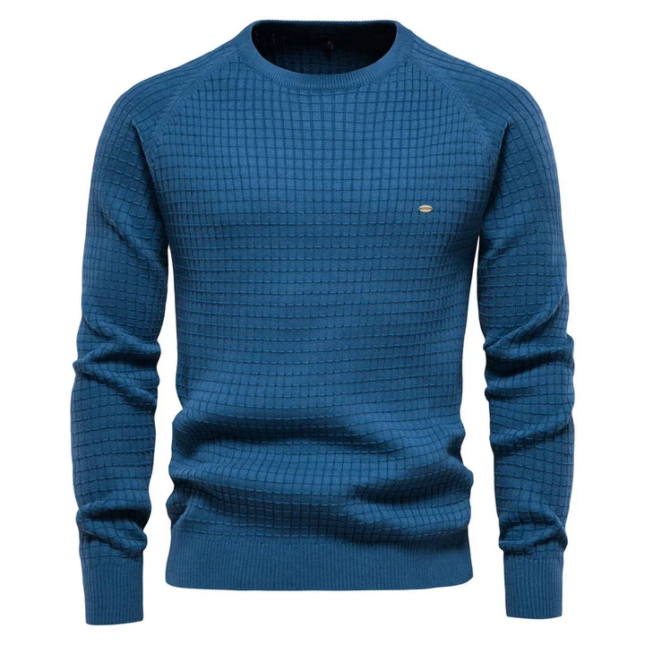 Pull long homme en maille chaude, idéal pour un hiver stylé. Confort et décontraction.