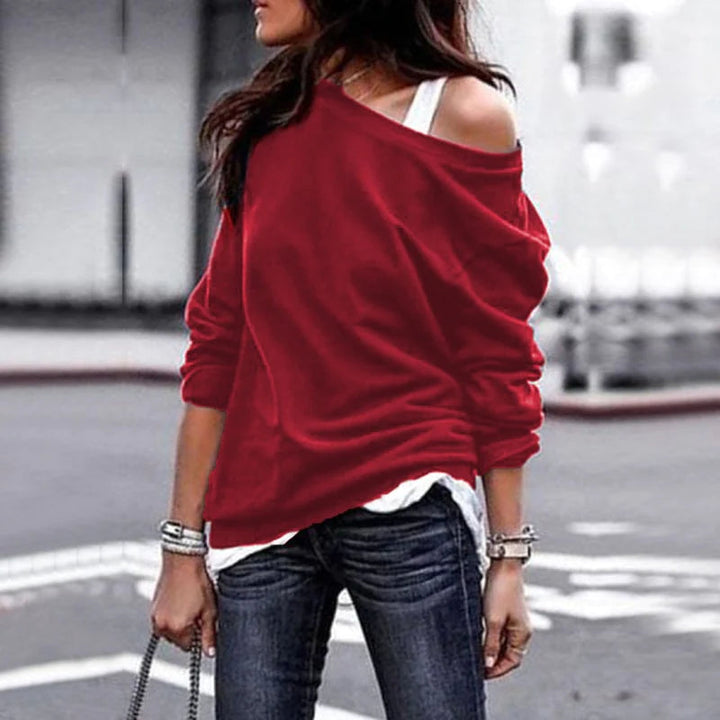 Pull chic femme à épaules dénudées en tricot doux, parfait pour l'automne-hiver. Confortable et tendance.