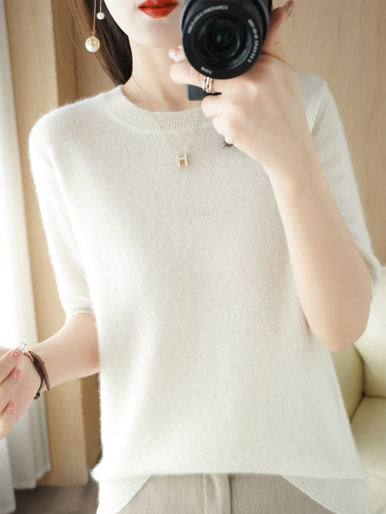 Haut uni classique pour femmes, look élégant et facile à porter au travail.