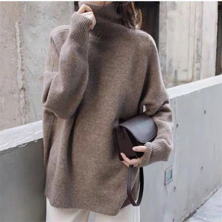 Pull à col roulé ample femme en tricot doux pour l'hiver, élégance décontractée et confort douillet.
