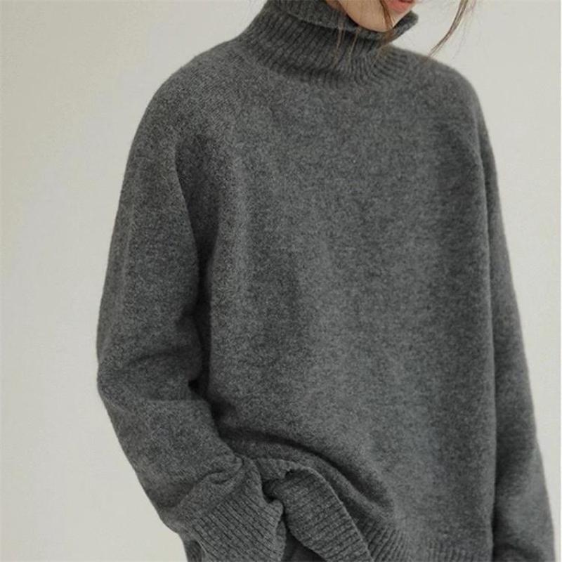 Pull femme oversize douillet et confortable, col roulé chic pour les journées froides d'automne/hiver.