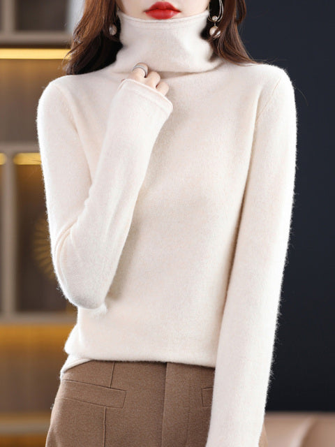 Chaud pull col roulé en laine pour femme, indispensable hiver pour rester au chaud.