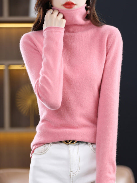 Tricot de laine confortable, pull col roulé femme, parfait pour affronter le froid avec style.